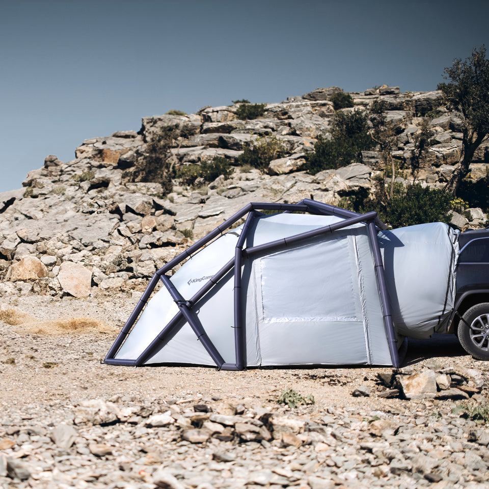 KingCamp BOUNDLESS AIR3 SUV tent at a rocky campsite